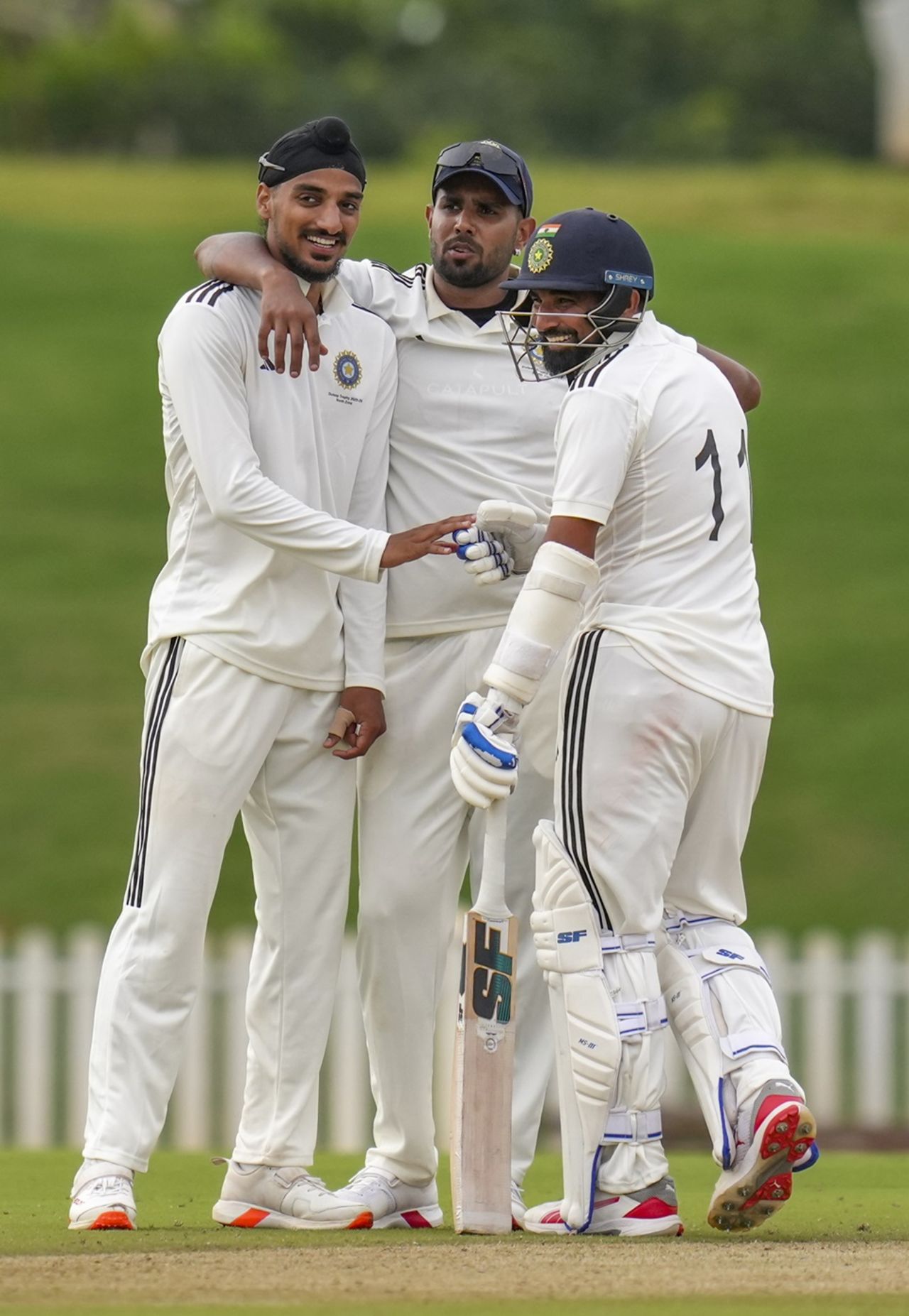 India fast bowlers Arshdeep Singh, Harshit Rana and Mohammed Shami share a light moment during a Duleep Trophy match, North Zone vs East Zone, Duleep Trophy, Quarter-final, BCCI CEG Ground, August 29, 2025