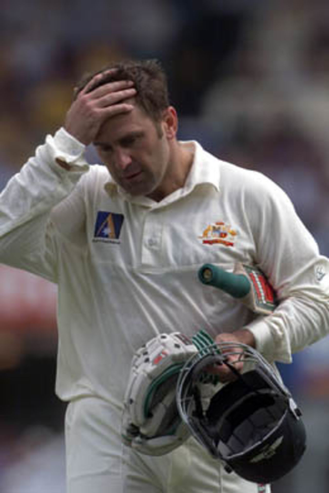 Mark Taylor hold his head after losing his wicket to Cork