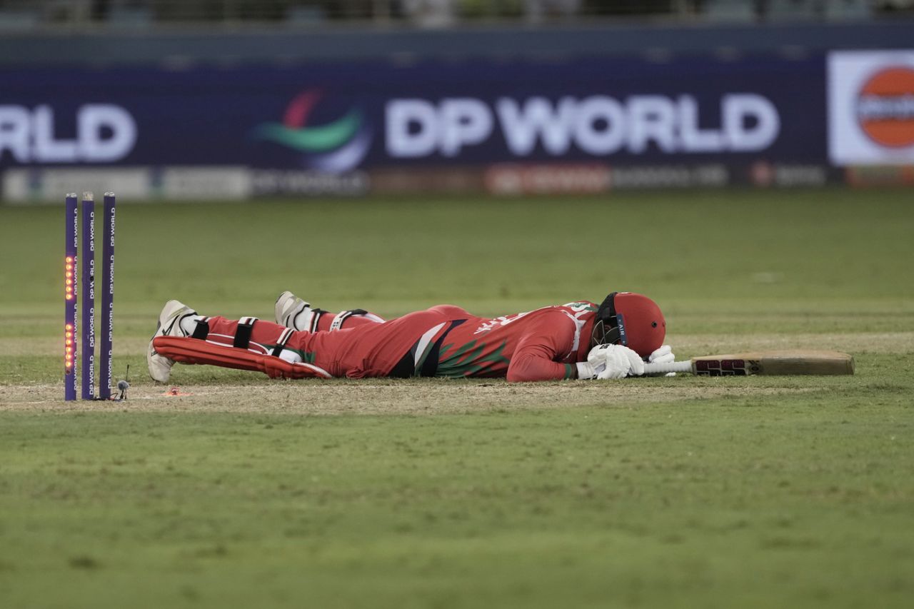 Vinayak Shukla lies on the ground, Pakistan vs Oman, Men's T20 Asia Cup, Dubai, September 12, 2025