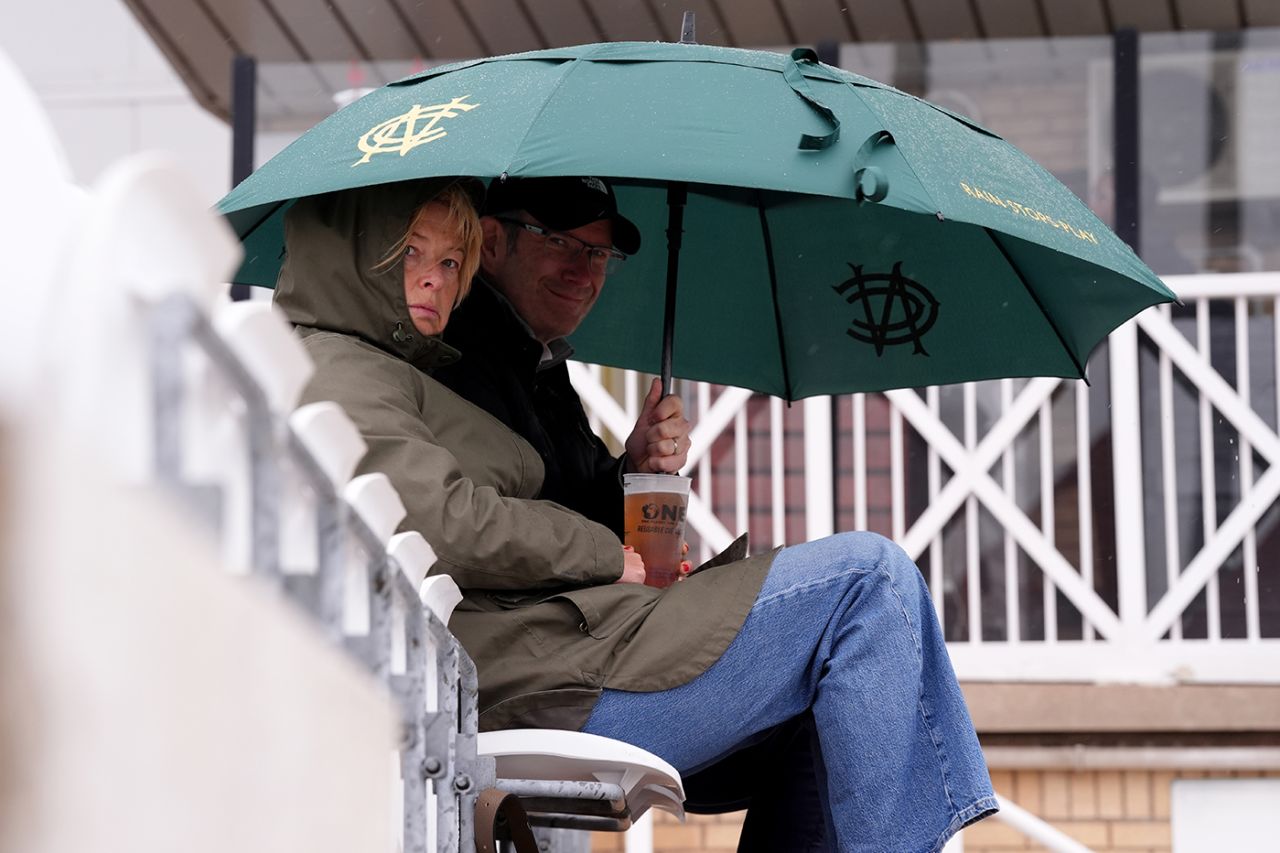 A couple shelter from the rain at Trent Bridge, England vs South Africa, 3rd Men's T20I, Trent Bridge, Nottingham, September 14, 2025