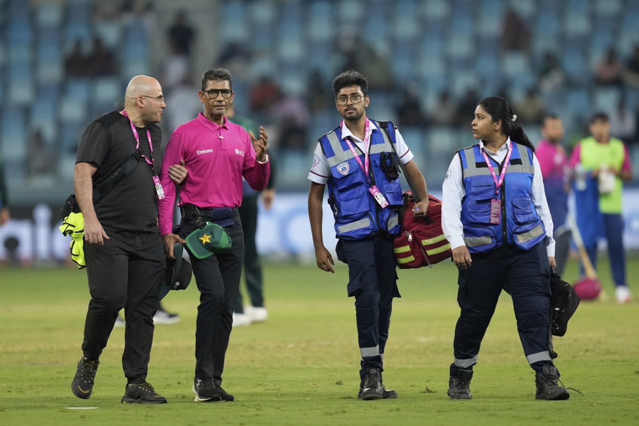 Umpire Ruchira Palliyaguruge is taken off the field after being hit by the ball, UAE vs Pakistan, Men's T20 Asia Cup, Dubai, September 17, 2025