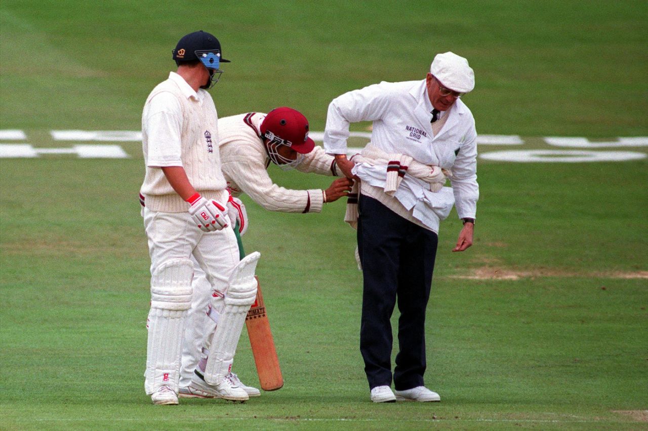 Dickie Bird is helped by Jimmy Adams after a collision in the field, England vs West Indies, 1st Test, Headingley, June 8, 1995