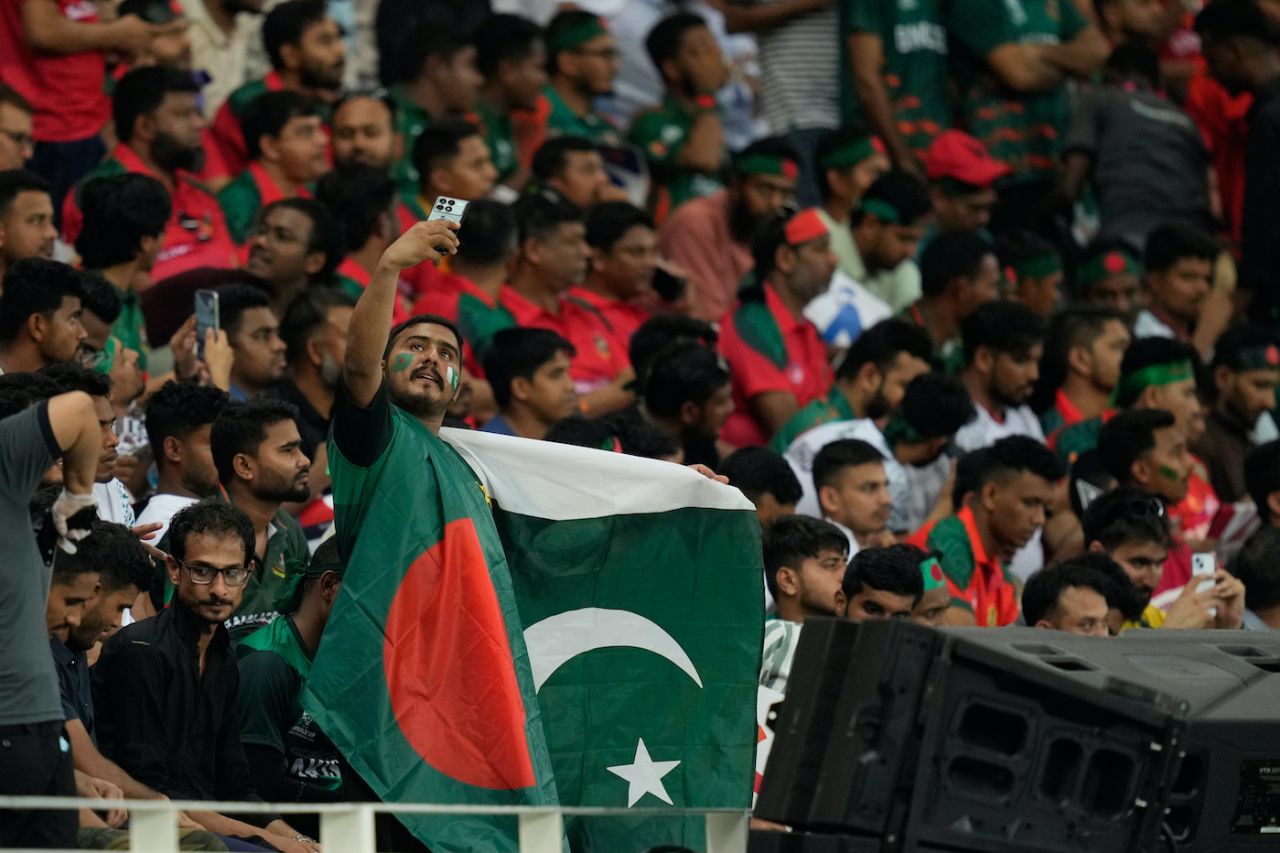 A fan with Pakistan and Bangladesh flags takes a selfie, Bangladesh vs Pakistan, Men's T20 Asia Cup, Dubai, September 25, 2025