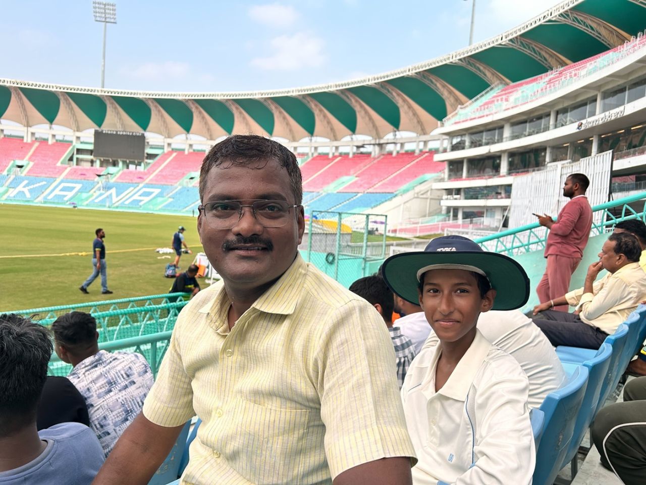 Gajendra Tripathi with his son Sanskar at the Ekana Stadium, India A vs Australia, Lucknow, September 26, 2025
