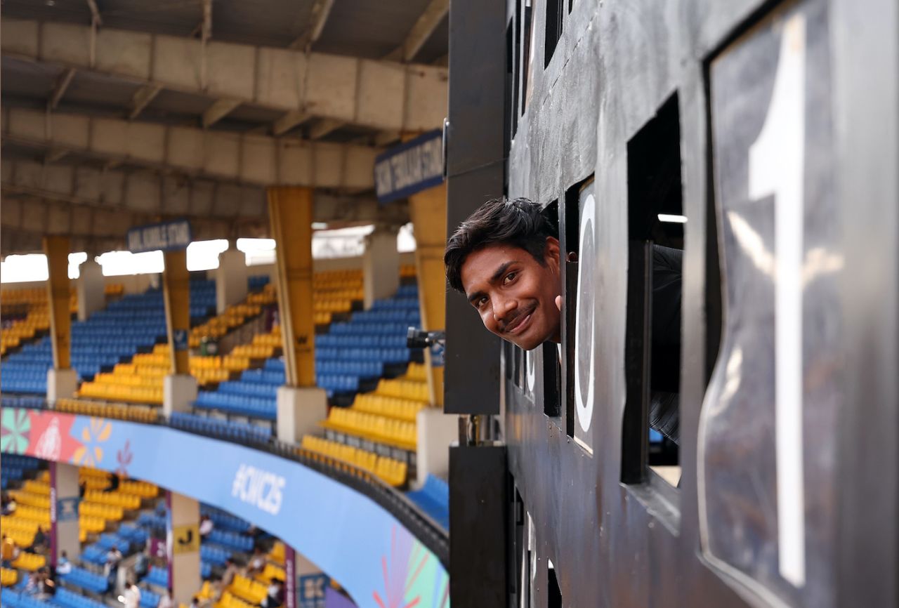 A scoreboard operator in Indore peeks for a picture, New Zealand vs South Africa, Women's ODI World Cup, Indore, October 6, 2025
