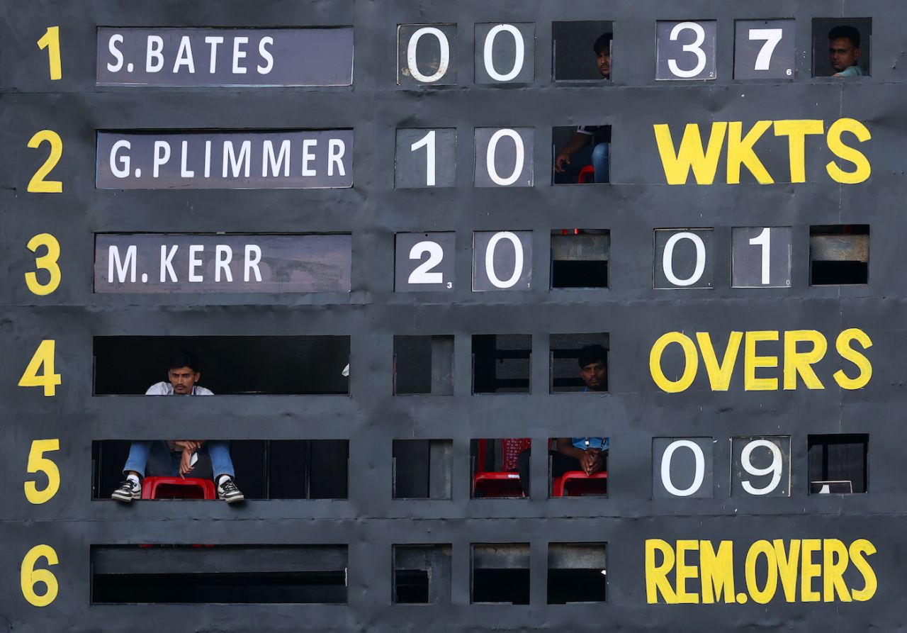 A scoreboard operator is ready to follow Amelia Kerr at No. 4, New Zealand vs South Africa, Women's ODI World Cup, Indore, October 6, 2025