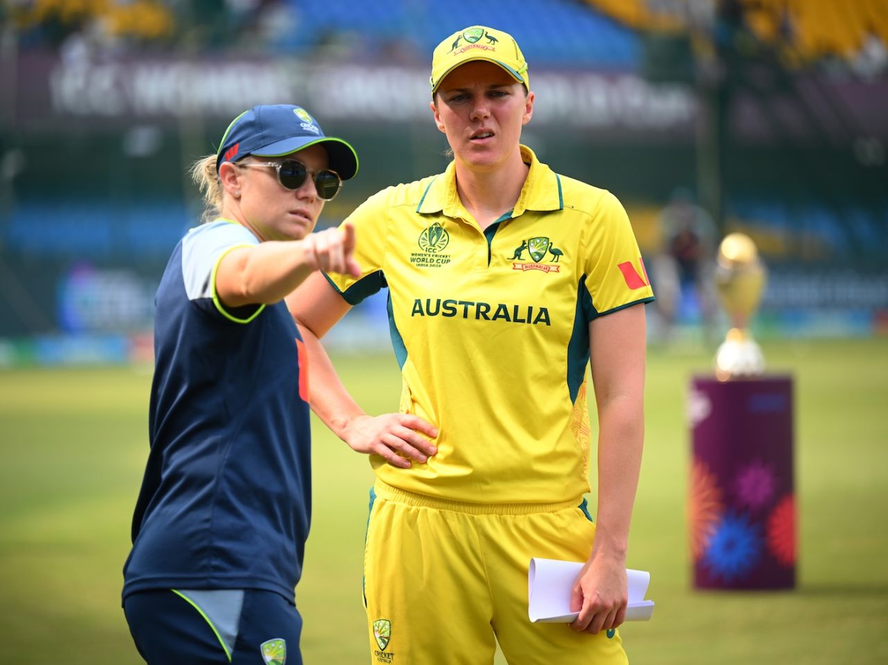 Alyssa Healy isn't playing, but that doesn't mean she can't have her say; Tahlia McGrath listens intently, Australia vs England, Women's World Cup, Indore, October 22, 2025