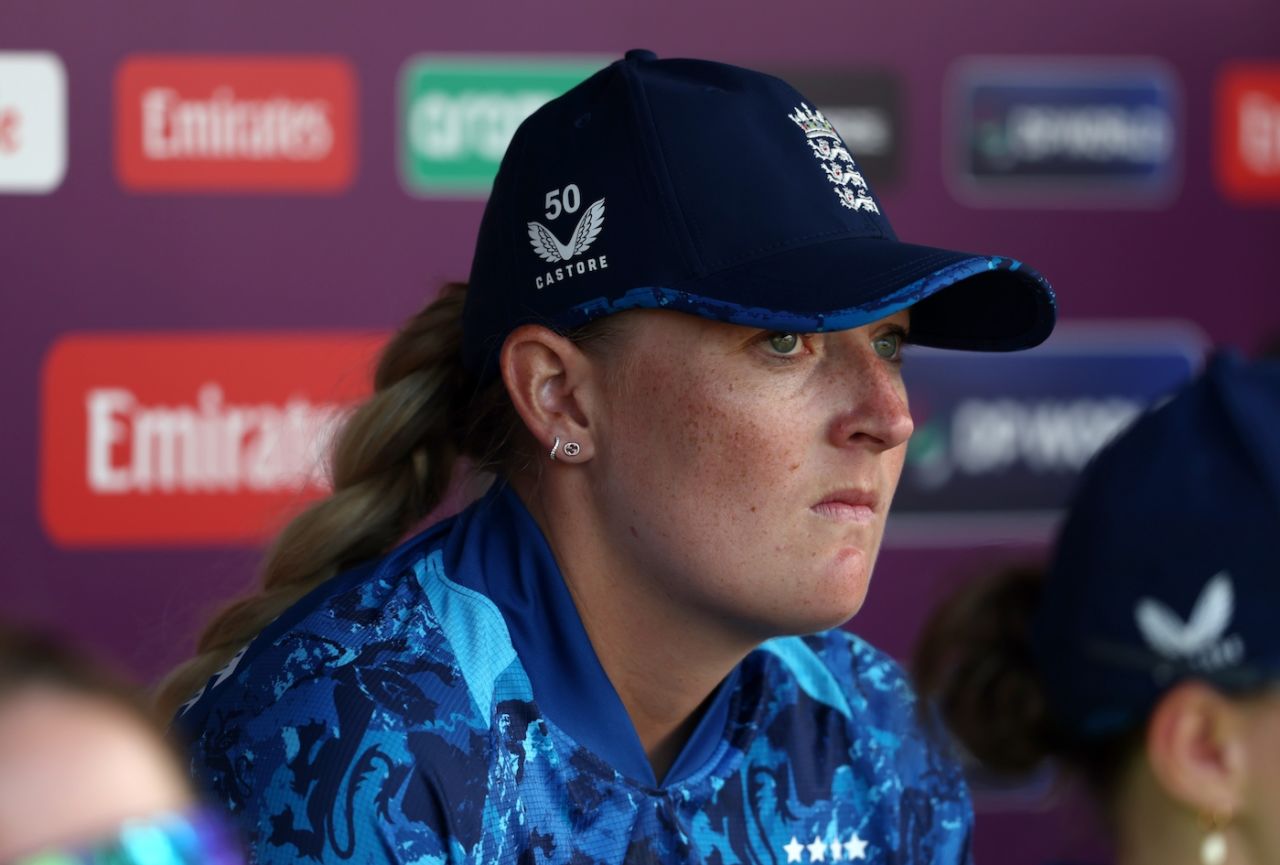 Sophie Ecclestone looks on from the dugout after hurting her left shoulder, England vs New Zealand, Women's World Cup, Visakhapatnam, October 26, 2025