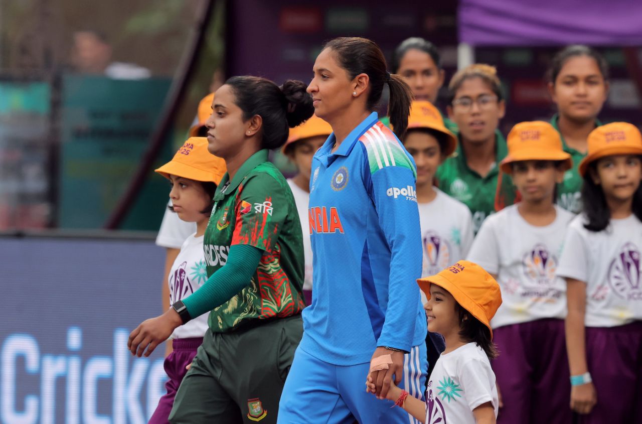 Nigar Sultana, Harmanpreet Kaur (and a happy-go-lucky mascot) walk out for the anthems, India vs Bangladesh, Women's World Cup 2025, Navi Mumbai, October 26, 2025