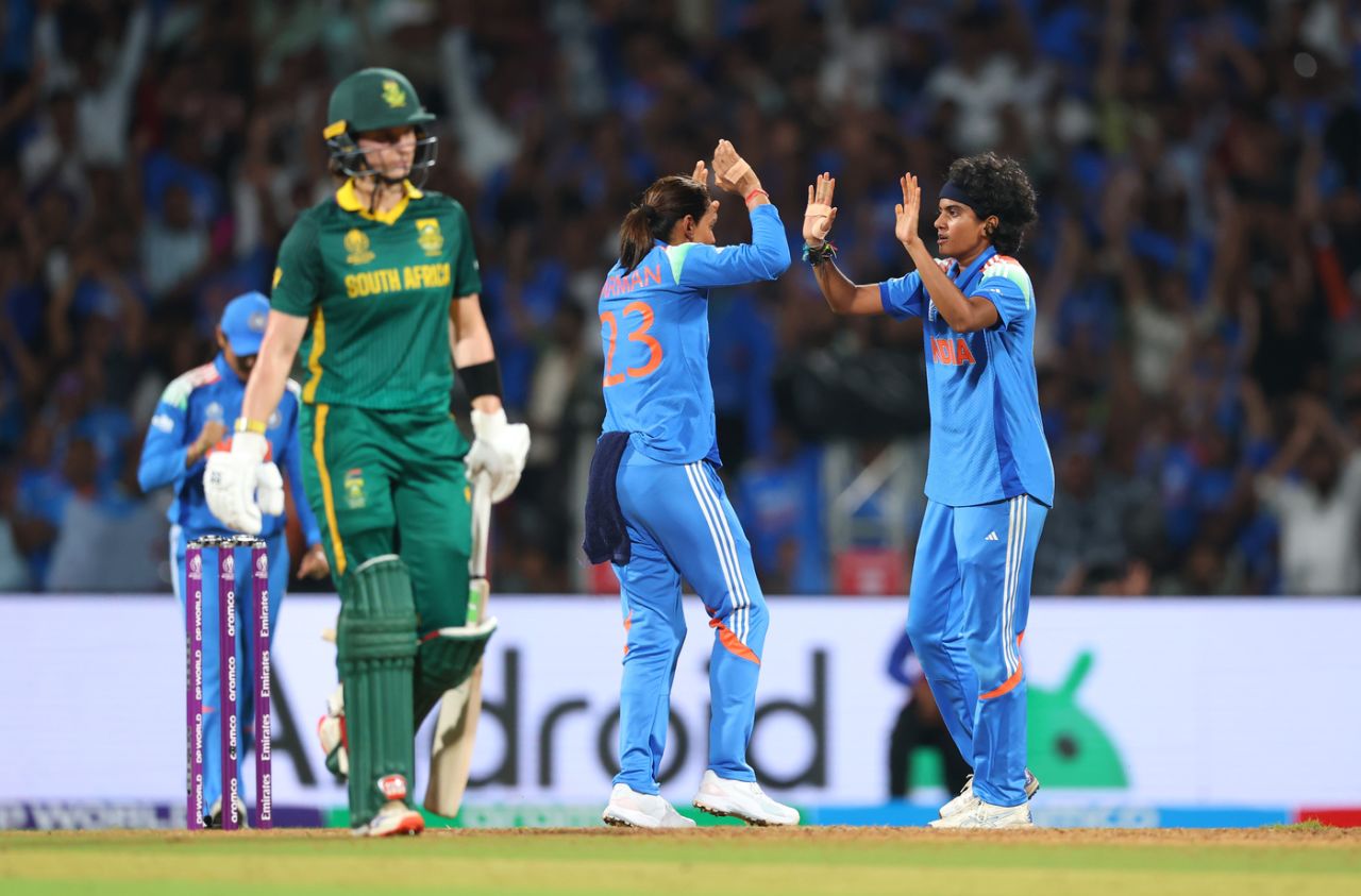 Shree Charani and Harmanpreet Kaur celebrate India's second wicket, India vs South Africa, Women's World Cup final, Navi Mumbai, November 2, 2025

