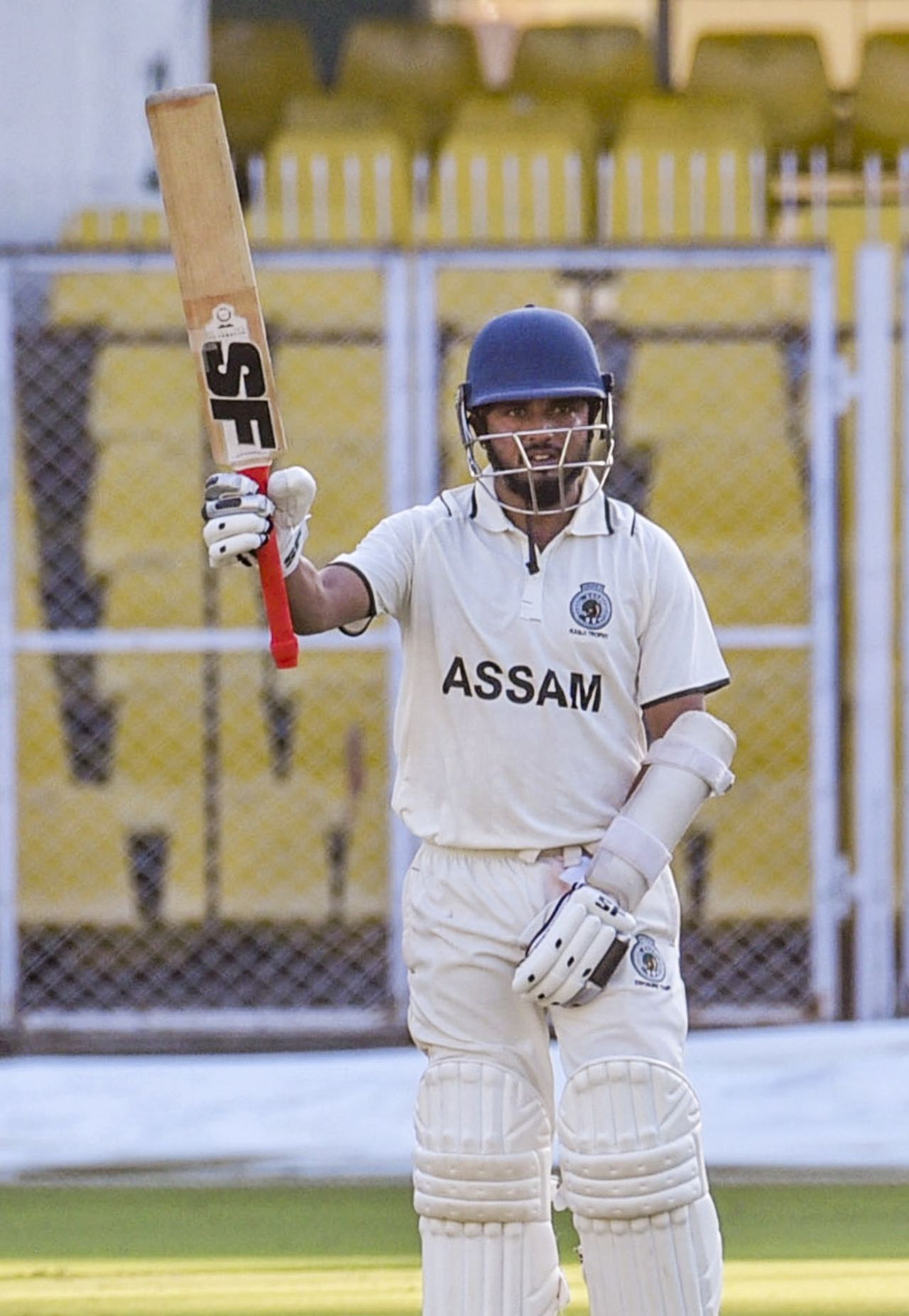Swarupam Purkayastha raises his bat after getting to a half-century, Assam vs Railways, Ranji Trophy 2025-26, 3rd day, Guwahati, November 3, 2025