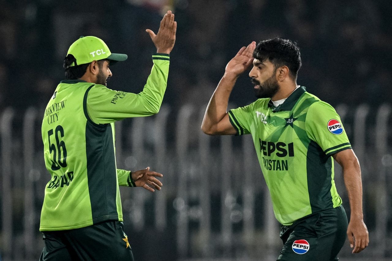 Babar Azam and Haris Rauf celebrate a wicket | ESPNcricinfo.com