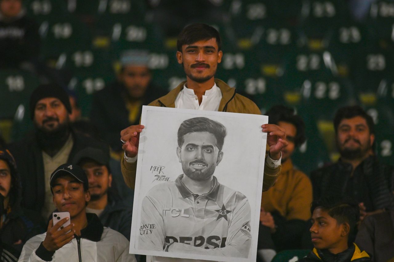 A fan holds up a sketching of Babar Azam, Pakistan vs Sri Lanka, 6th match, T20I tri-series, Rawalpindi, November 27, 2025