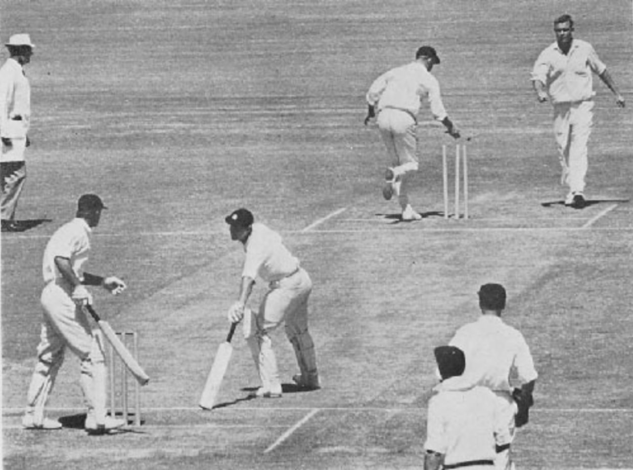 Ted Dexter is run out after finishing at the same end as Geoff Boycott  - Graeme Pollock breaks the wicket, South Africa v England, 5th Test, 1964-65
