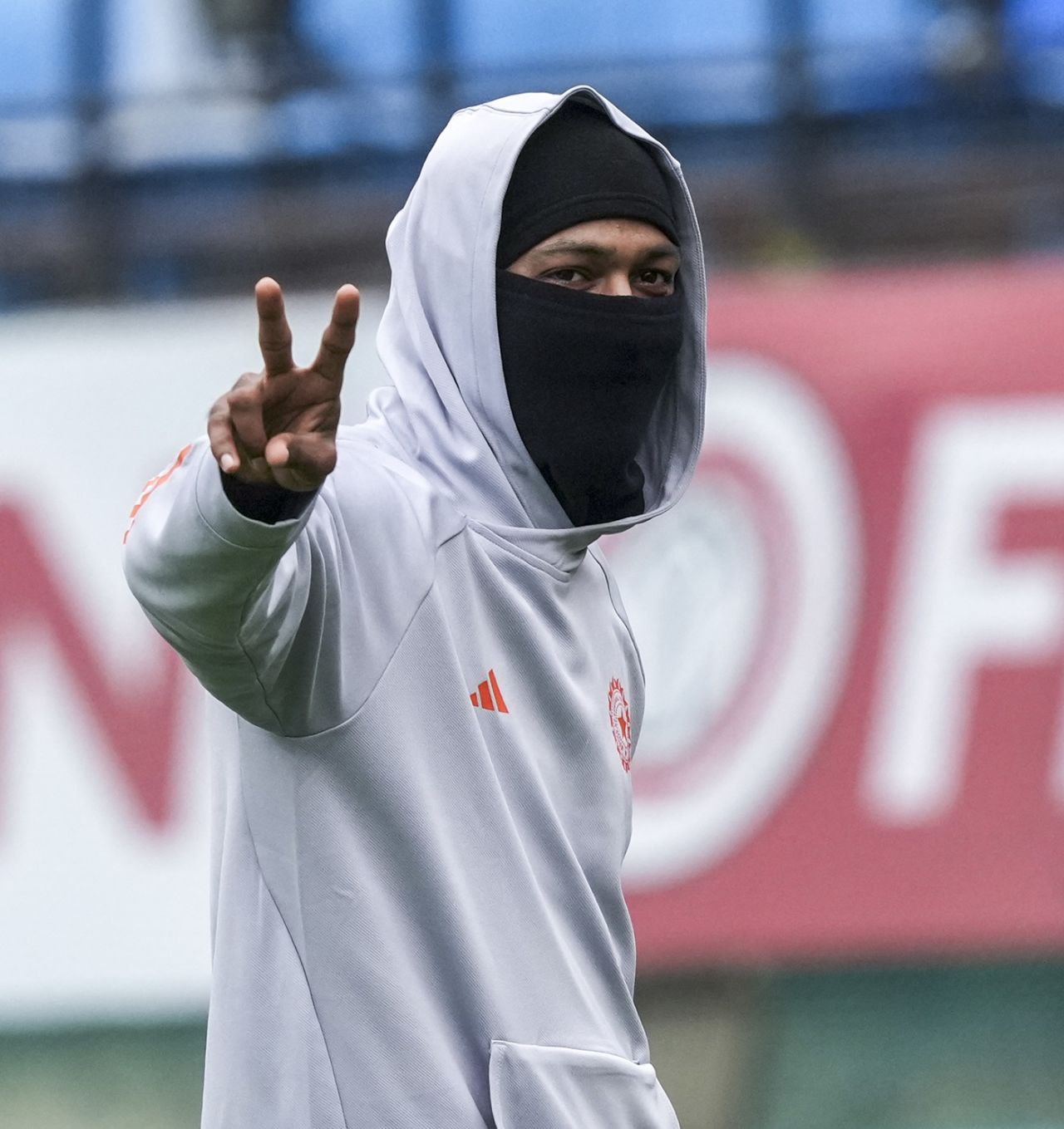 Hardik Pandya protects himself against the Dharamsala cold, Dharamsala, December 13, 2024