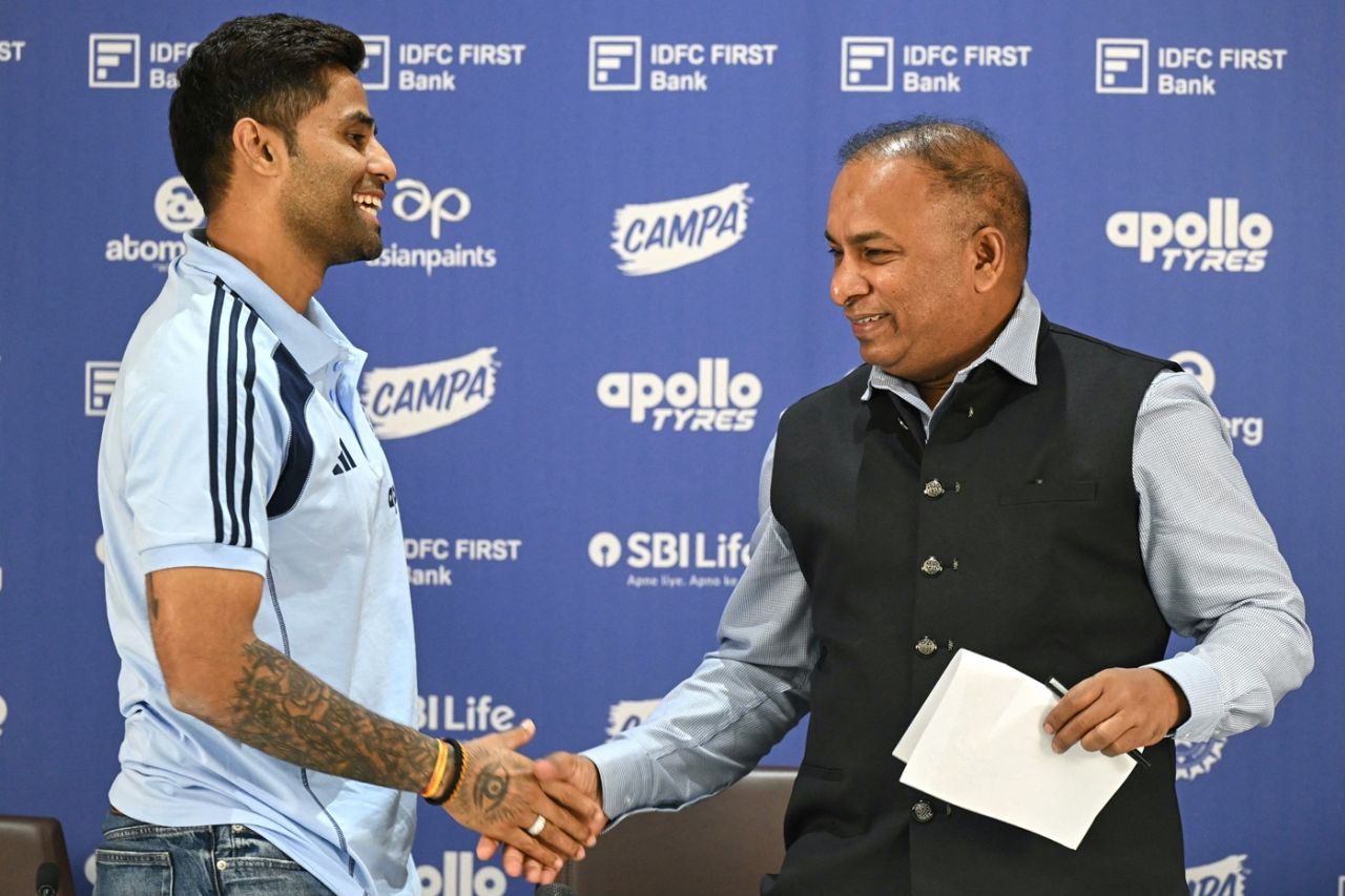 Suryakumar Yadav and Devajit Saikia exchange handshakes, Mumbai, December 20, 2025