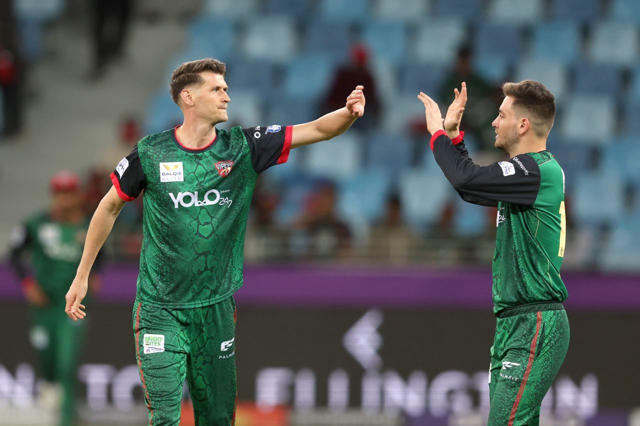 David Payne celebrates a wicket with Noor Ahmad, Desert Vipers vs Sharjah Warriorz, ILT20 2025-26, Dubai, December 20, 2025