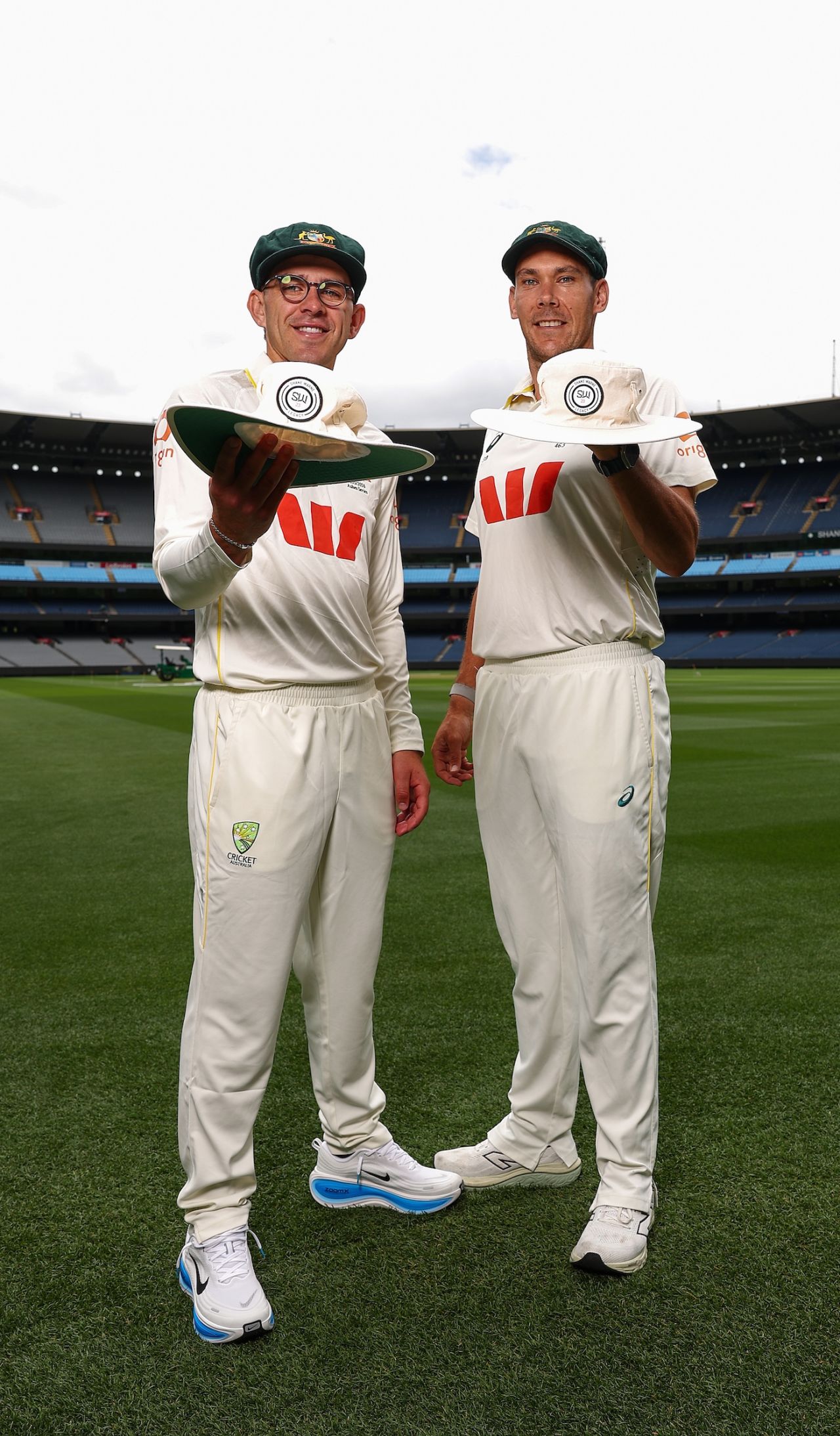 Todd Murphy and Scott Boland pose with Shane Warne floppies, Australia vs England, 4th Test, Melbourne, December 24, 2025