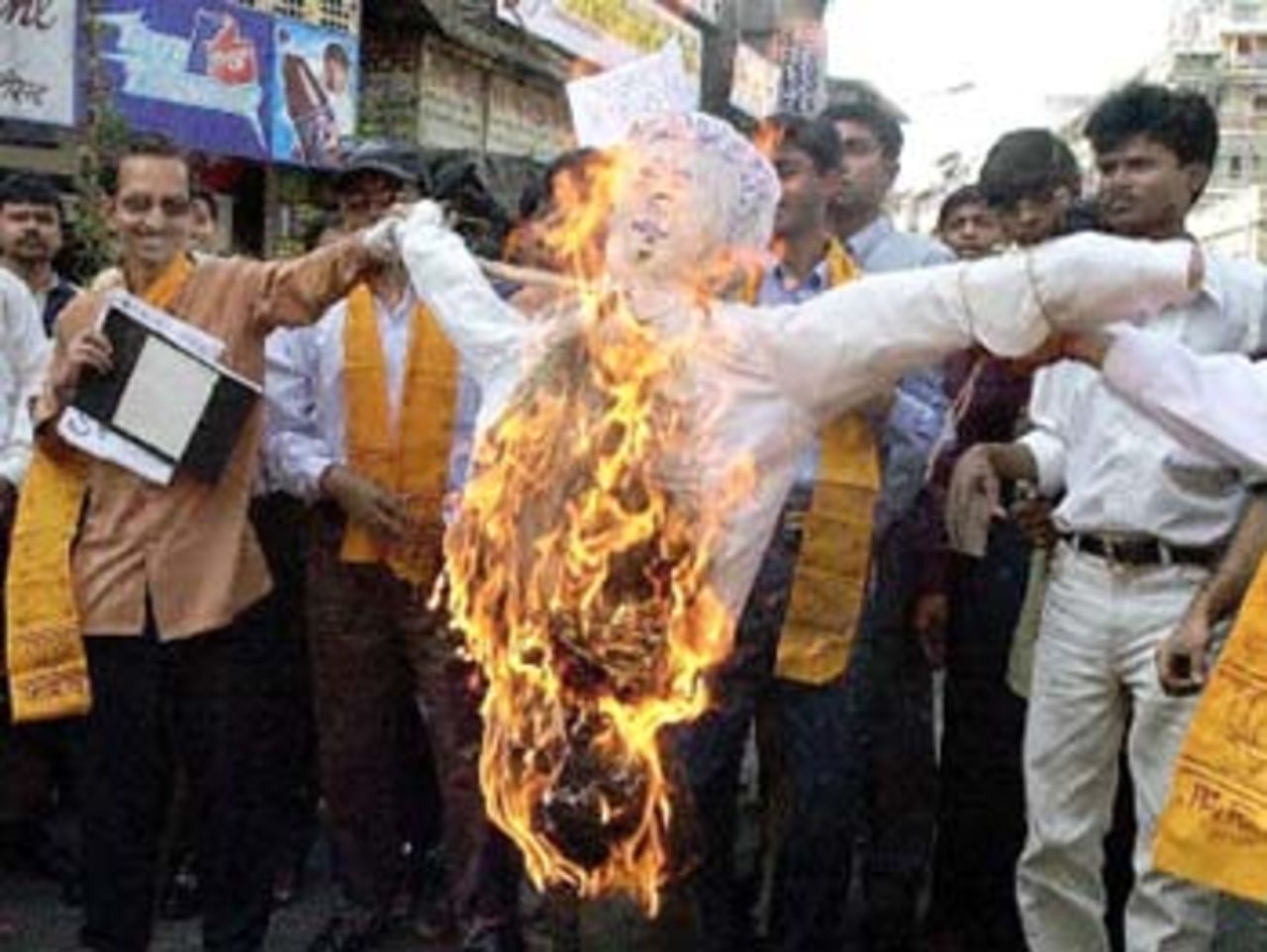 Bharatiya Janata Party activists burn an effigy of former Indian cricket captain Mohammed Azharuddin during a demonstration 02 November 2000 in Bombay. India's Central Bureau of Investigation (CBI), in a report submitted to the Indian Sports Minister, has named Azharuddin along with other top international cricket players as being involved in match-fixing for cash, November 4, 2000