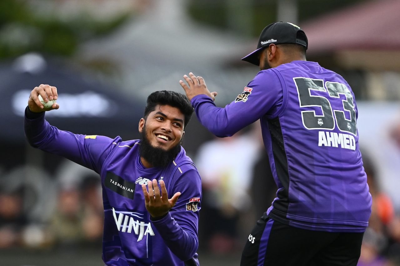 Rishad Hossain looks pleased after taking the catch to dismiss Josh Brown, Hobart Hurricanes vs Melbourne Renegades, BBL, Hobart, December 29, 2025