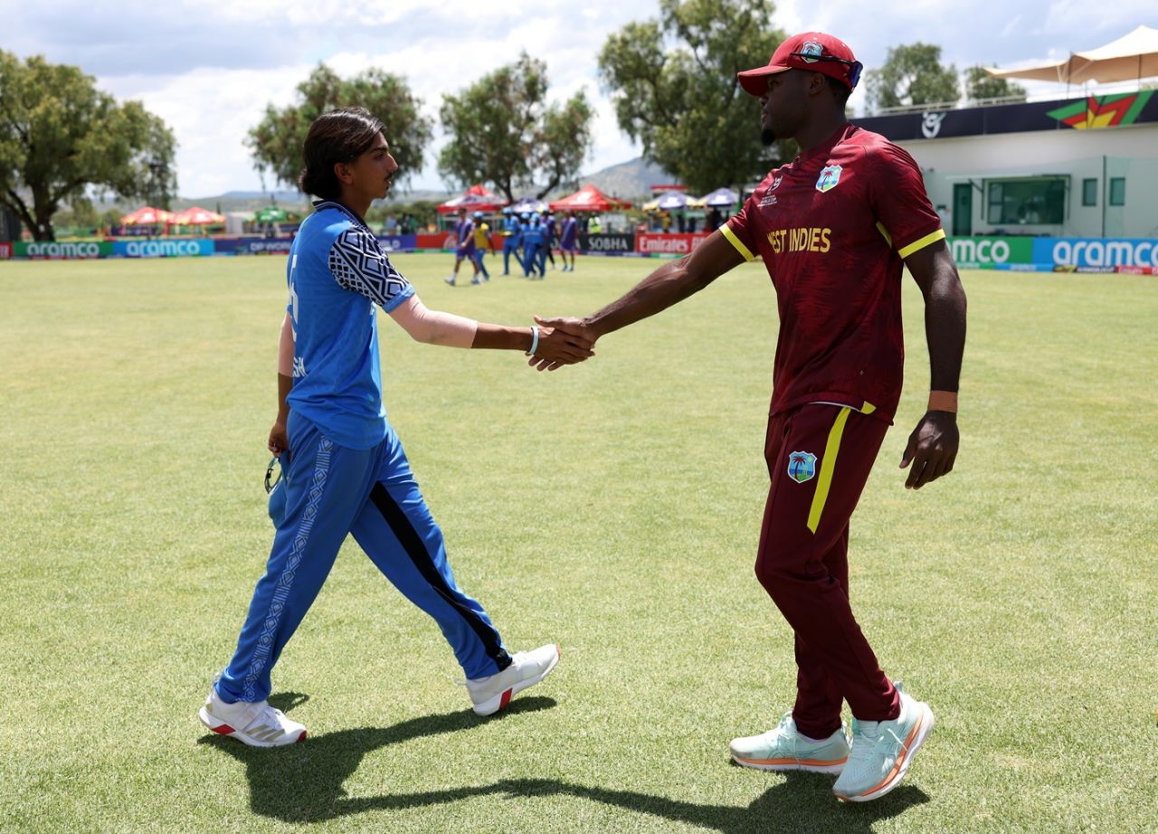 Joshua Dorne and Laksh Bakrania shake hands after the game, Zimbabwe U-19 vs Tanzania U-19, 2026 Men's U19 World Cup, Windhoek, January 15, 2026