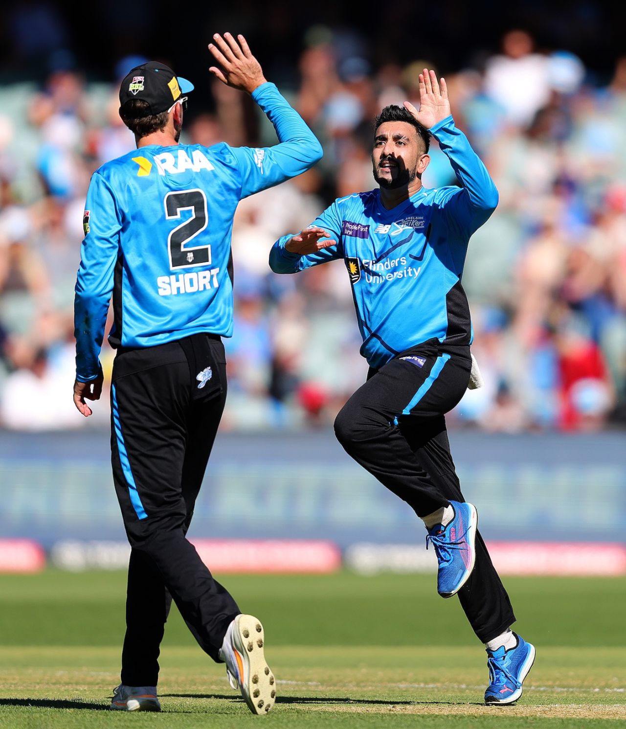 Tabraiz Shamsi celebrates a wicket with Matt Short, Adelaide Strikers vs Melbourne Renegades, BBL, Adelaide, January 17, 2026