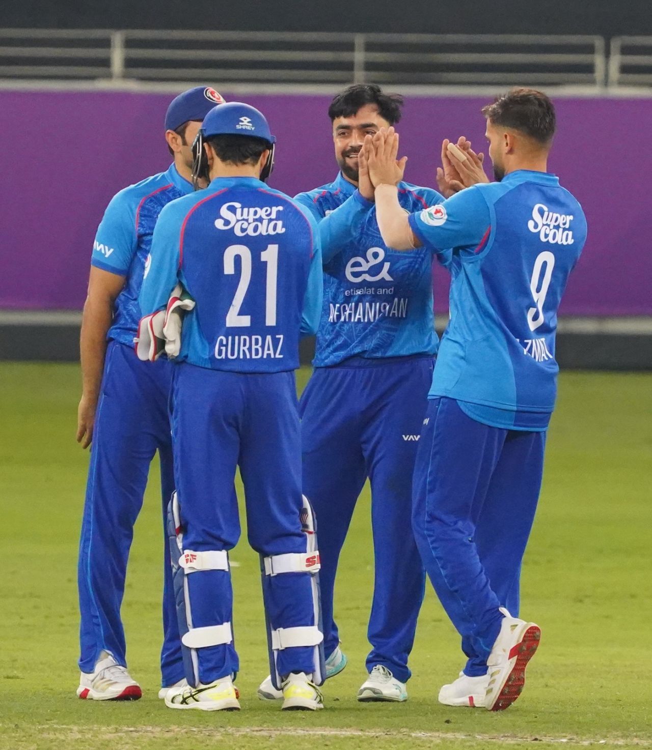 Rashid Khan celebrates a wicket with his team-mates, Afghanistan vs West Indies, 1st T20I, Dubai, January 19, 2026
