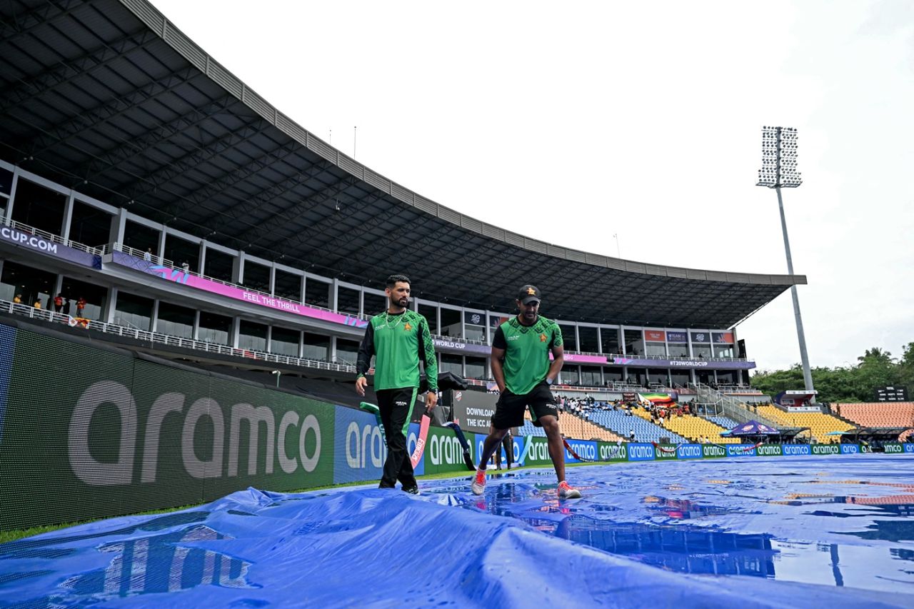 Sikandar Raza takes a stroll around a very wet set of covers, Ireland vs Zimbabwe, T20 World Cup 2026, Pallekele, February 17, 2026