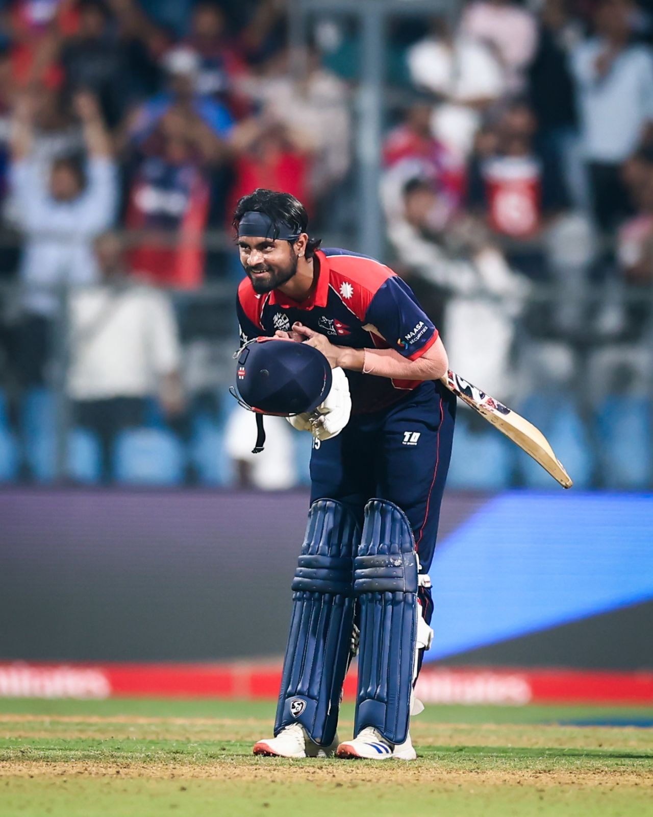 Gulsan Jha celebrates after hitting the winning runs, Scotland vs Nepal, T20 World Cup, Mumbai, February 17, 2026 