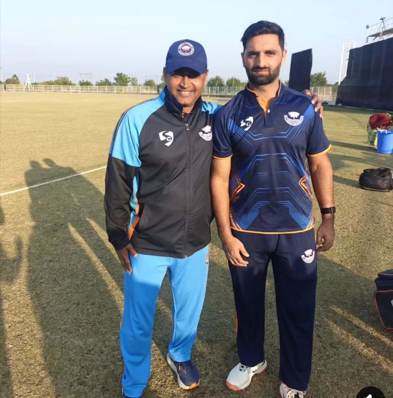 J&K bowling coach P Krishnakumar with Auqib Nabi