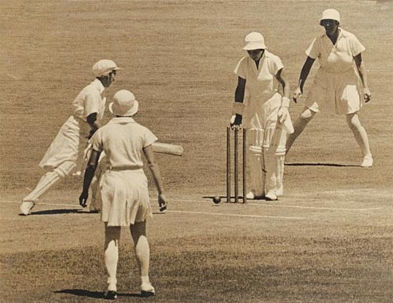 Anne Palmer is bowled for 11 as Mary Spear, Betty Snowball and Joy Partridge look on, Australia v England, 3rd womens Test, Melbourne, January 20, 1935