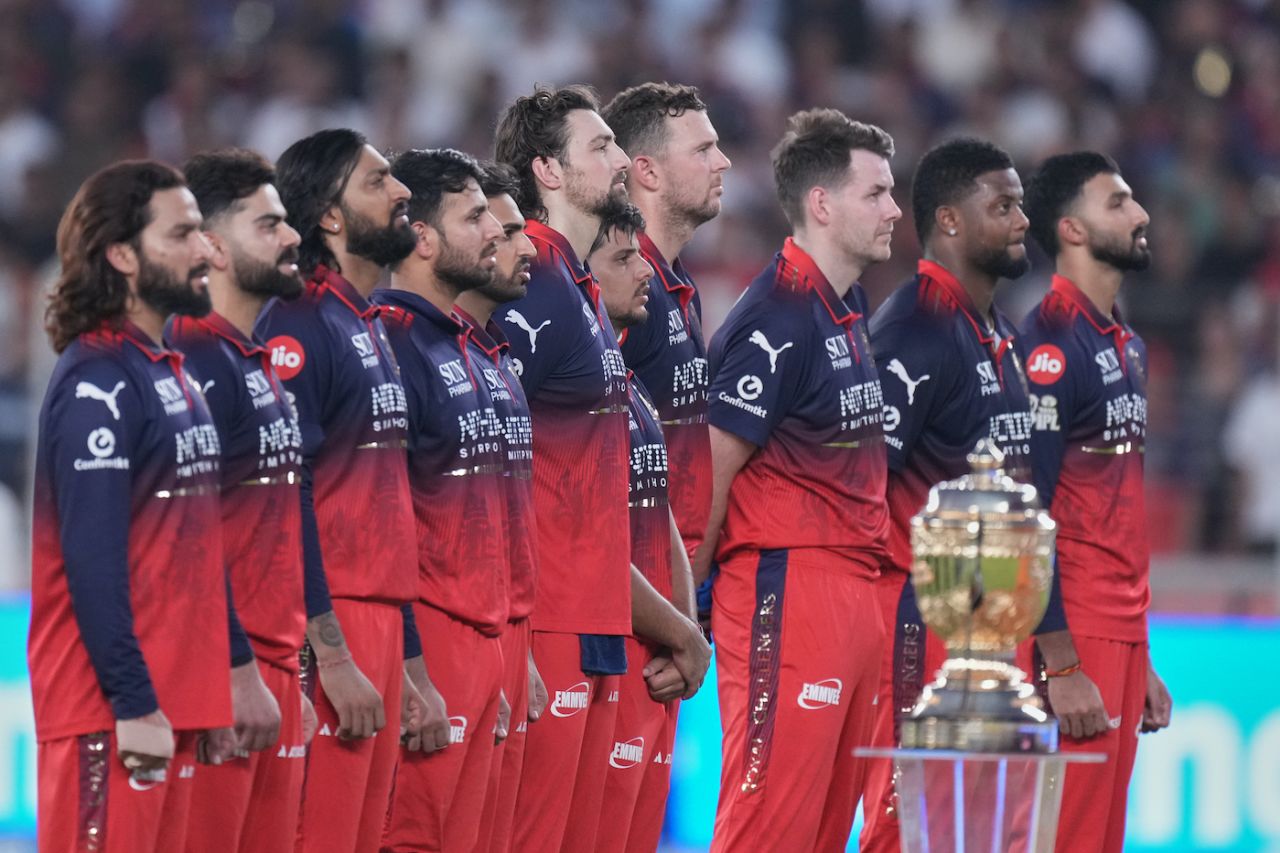 RCB players stand alongside the trophy during the National anthem, Royal Challengers Bengaluru vs Gujarat Titans, IPL 2026, final, Ahmedabad, May 31, 2026