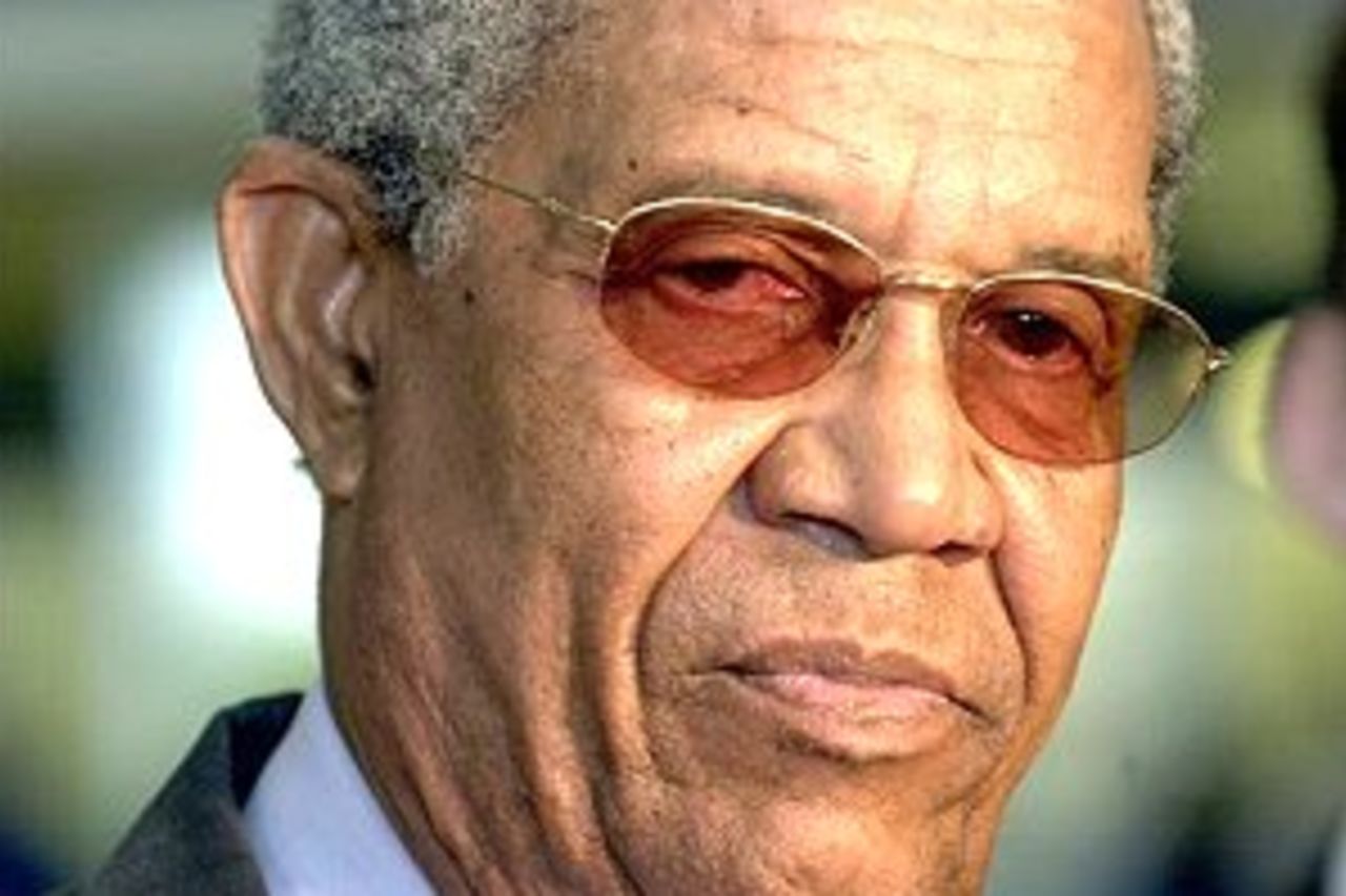 Sir Garfield Sobers of the West Indies talks to the media after arriving at Brisbane International Airport in Brisbane, Australia. He is in Brisbane as part of the 40th anniversary celebrations of the Tied Test during the 1960-61 West Indies cricket tour of Australia.