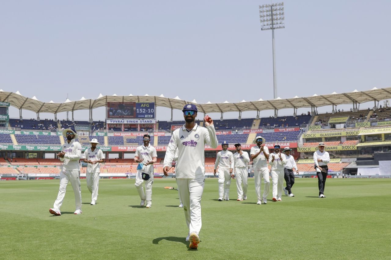 Manav Suthar walks back with the ball with which he picked up six wickets on debut, India vs Afghanistan, Only Test, 3rd day, New Chandigarh, June 8, 2026