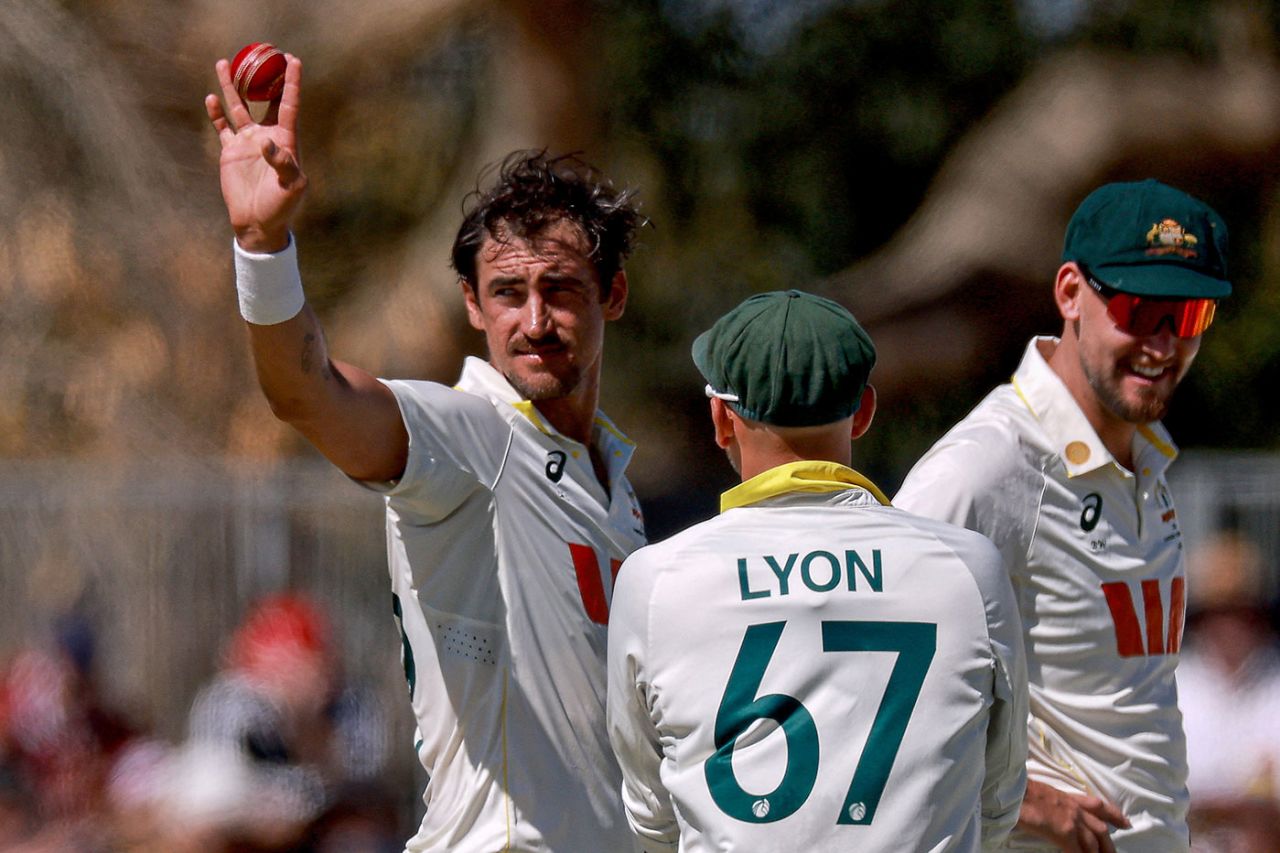 Mitchell Starc holds the ball aloft for his 22-ball five-wicket haul, Australia vs Bangladesh, 2nd Test, Mackay, 1st day, August 22, 2026