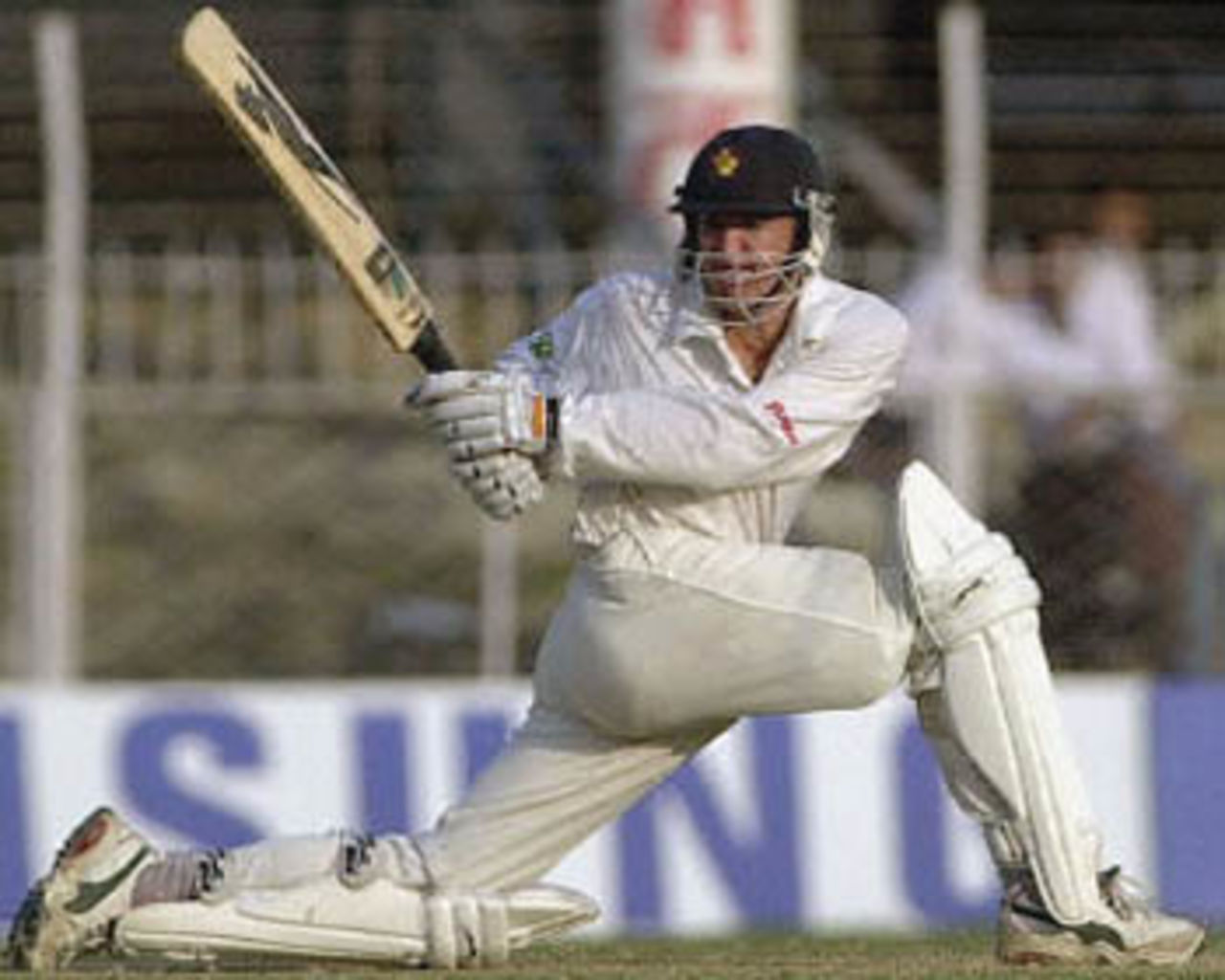 Andy Flower sweeps Sharandeep to the boundary, Zimbabwe in India, 2000/01, 2nd Test, India v Zimbabwe, Vidarbha C.A. Ground, Nagpur, 25-29 November 2000 (Day 4).