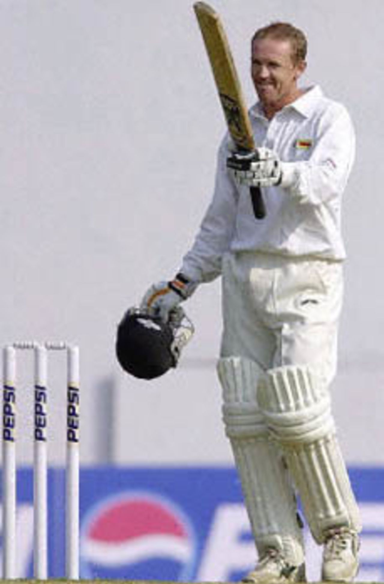 Andy Flower acknowledges the crowd as he reaches his century, Zimbabwe in India, 2000/01, 2nd Test, India v Zimbabwe, Vidarbha C.A. Ground, Nagpur, 25-29 November 2000 (Day 5).