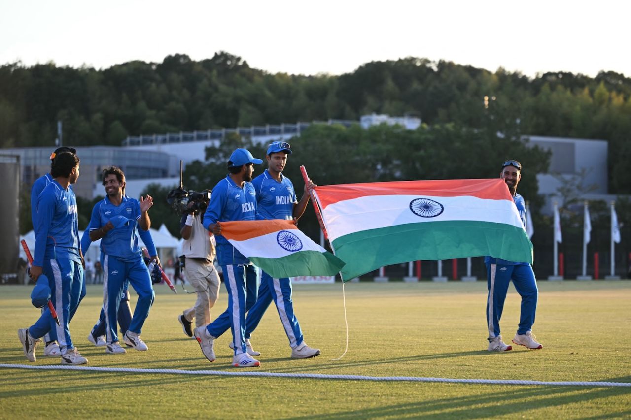 The India players celebrate their gold medal by doing a victory lap of the stadium, India vs Pakistan, Asian Games men's competition final, Nisshin, October 3, 2026