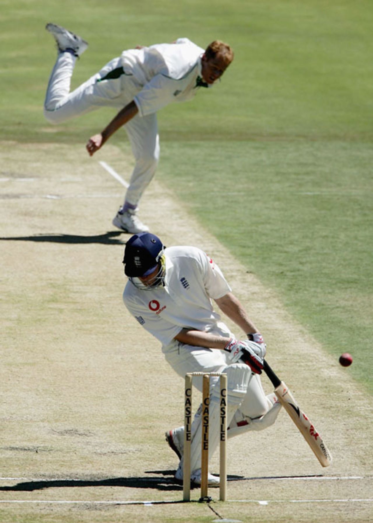 Andrew Flintoff ducks out of the way of a Shaun Pollock bouncer, South Africa v England, 5th Test, Centurion, January 24, 2005