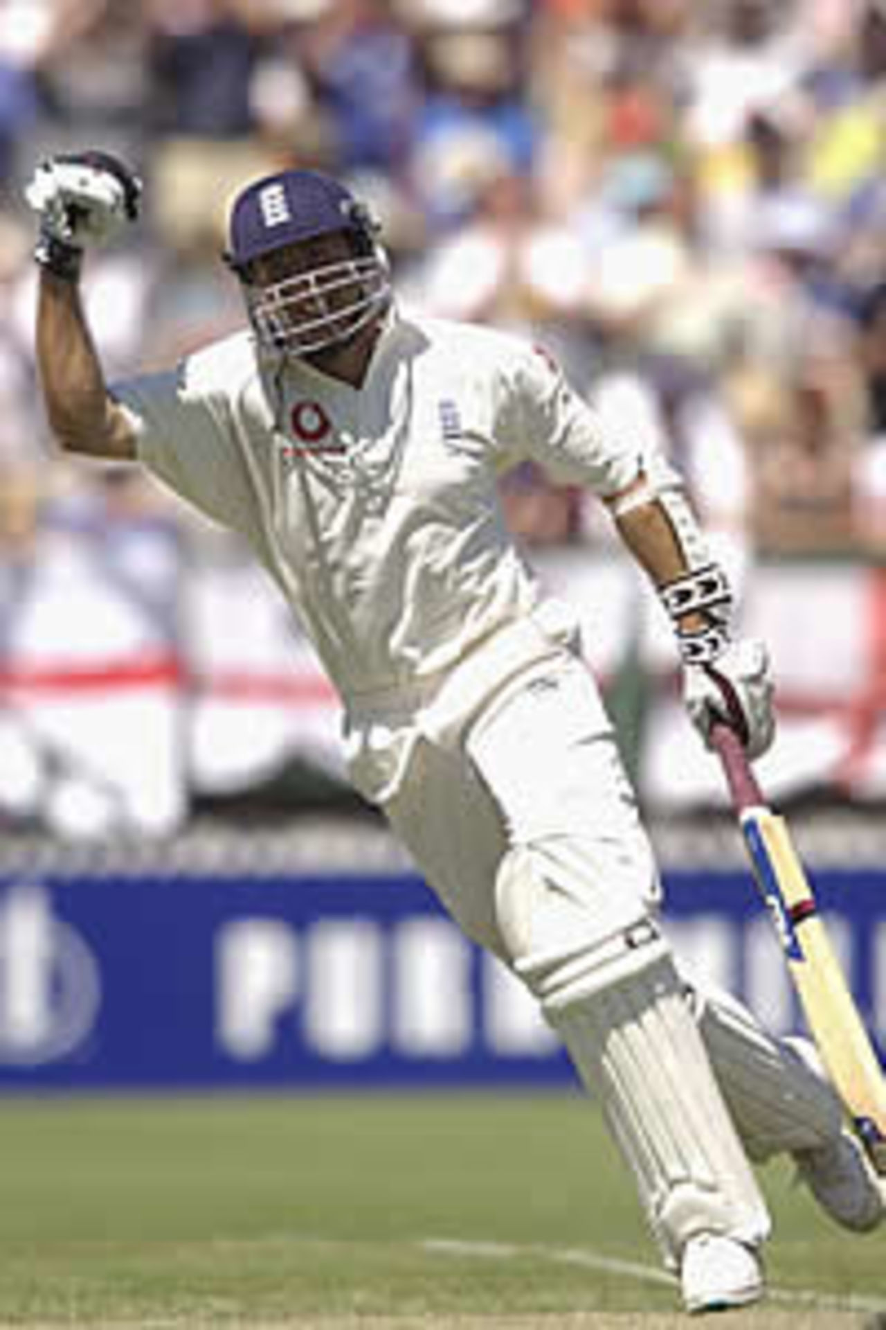 ADELAIDE - NOVEMBER 21: Michael Vaughan of England celebrates reaching his century during the first day of the Second Ashes Test between Australia and England at the Adelaide Oval, Adelaide, Australia on November 21, 2002.