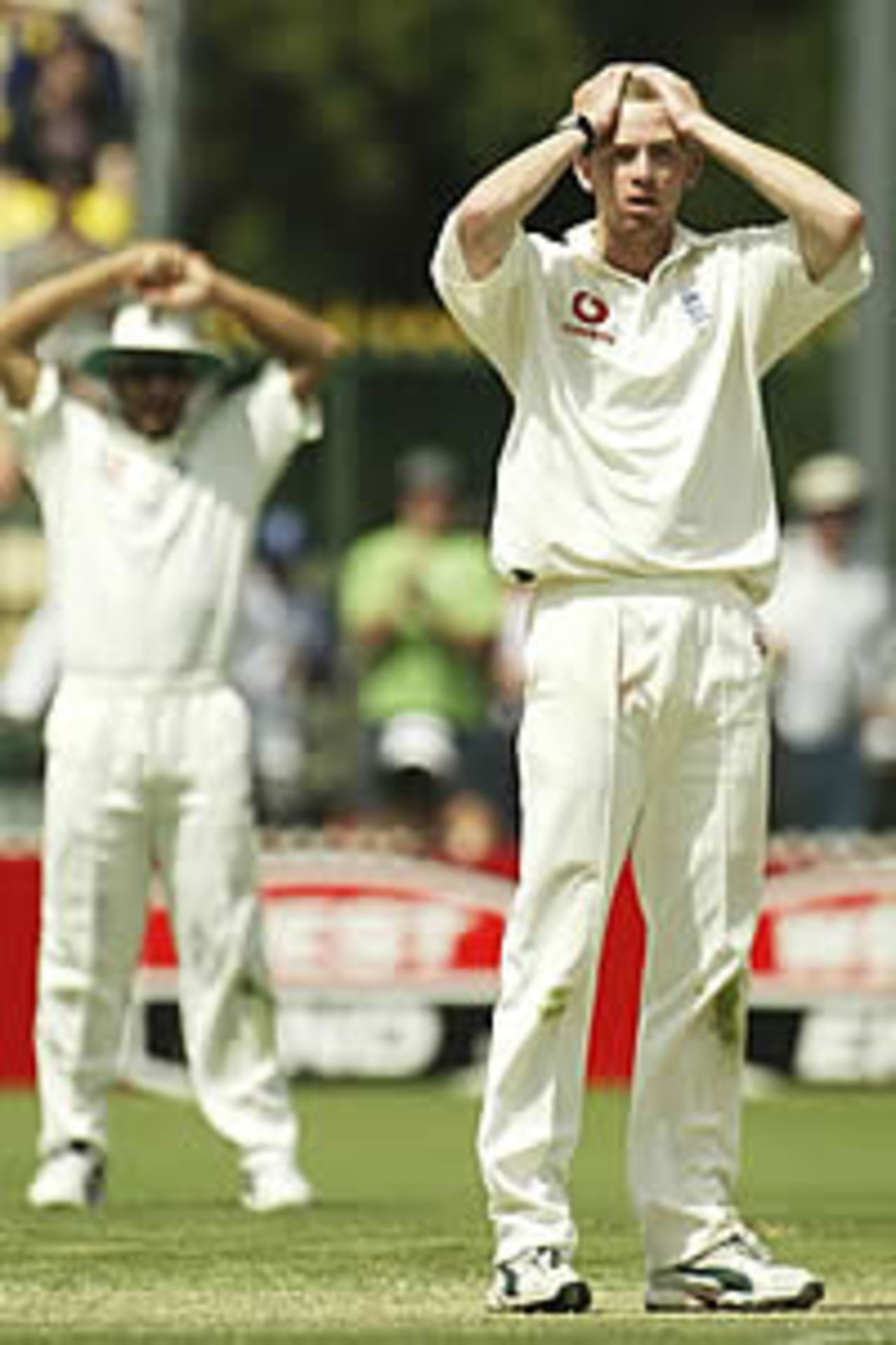ADELAIDE- NOVEMBER 23: Richard Dawson of England watches a shot from six from Adam Gilchrist clear the boundary during the third day of the second Ashes Test between Australia and England played at Adelaide Oval in Adelaide, Australia, on November 23, 2002.