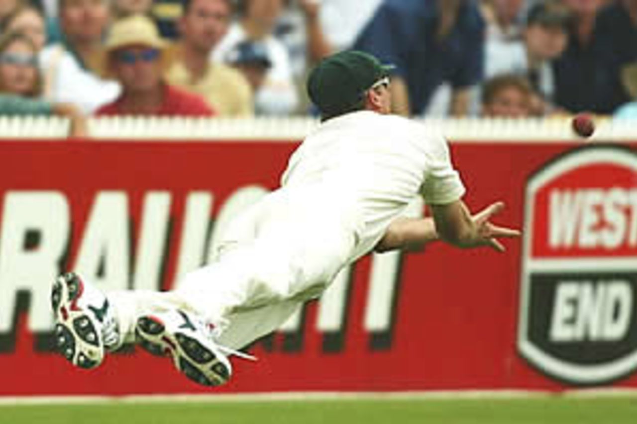 ADELAIDE - NOVEMBER 24: Glenn McGrath of Australia takes a catch to dismiss Michael Vaughan of England during the fourth day of the Second Ashes Test between Australia and England at the Adelaide Oval in Adelaide, Australia on November 24, 2002.