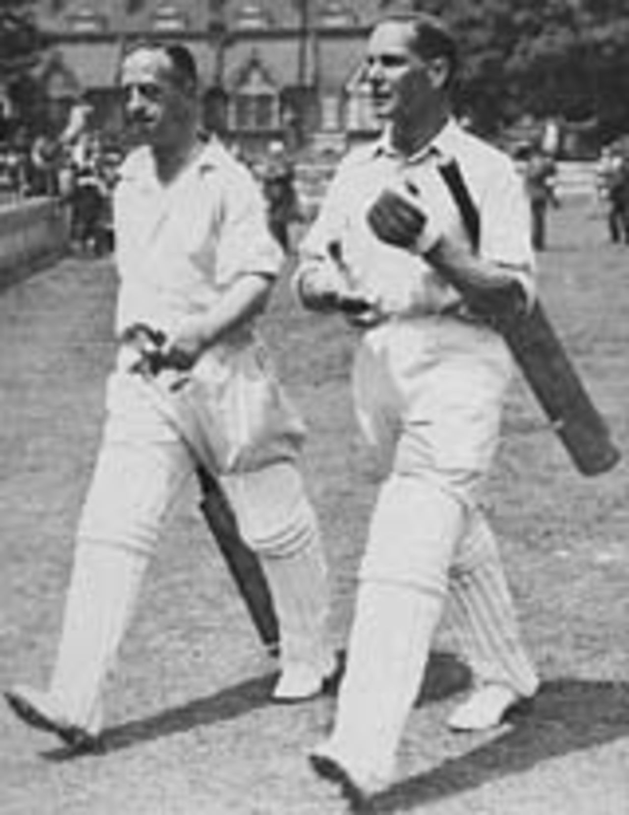 Percy Holmes and Herbert Sutcliffe return to the pavilion after their 555 first-wicket stand.  Holmes made 224 and Sutcliffe 313, Essex v Yorkshire, Leyton, June 16, 1932