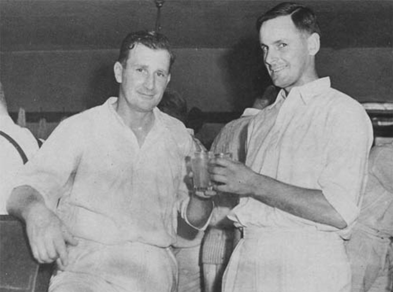 Jim Laker is congratulated by Peter May after taking 19 wickets, England v Australia, Manchester, July 31, 1956