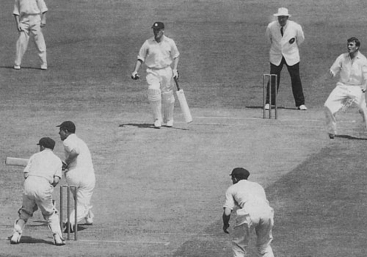 Denis Compton, in his last innings in Australia, sweeps Benaud; non-striker Trevor Bailey, 1954-55