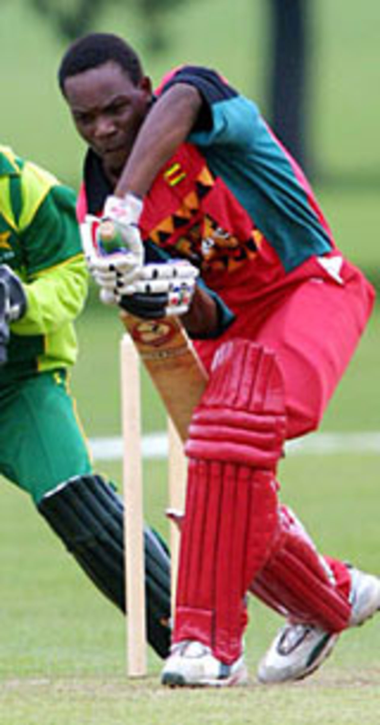 Zimbabwe Under-19 batsman Hamilton Masakadza plays a defensive shot, Pakistan Under-19 v Zimbabwe Under-19, Hagley Oval, Christchurch, January 16 2002