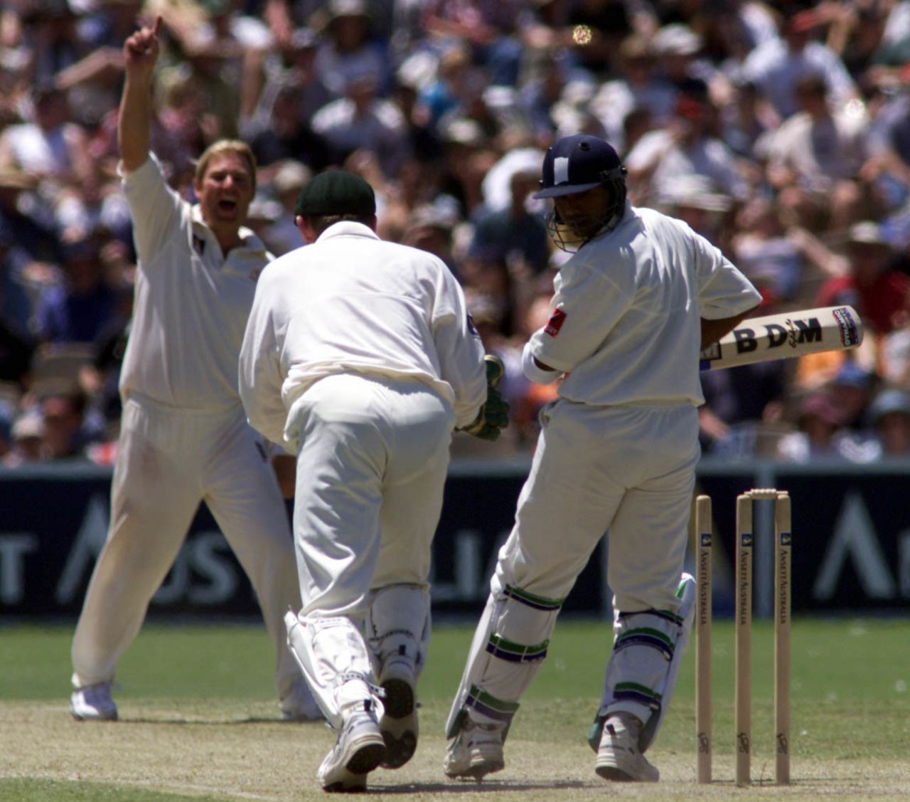 MSK Prasad  looks back to see his stumps disturbed, Australia vs India, 1st Test, 3rd day, Adelaide, December 12, 1999