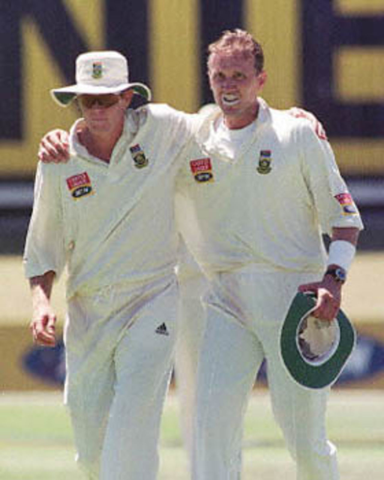 Allan Donald accompanies Shaun Pollock after the New Zealand innings, South Africa v New Zealand, 2nd Test, Port Elizabeth, December 1, 2000