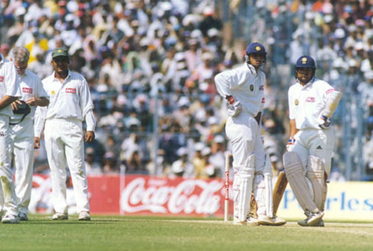 Sachin Tendulkar and Rahul Dravid waiting for the third umpire's decision on the fateful run out dismissal of Tendulkar, India v Pakistan, Asia Test Championship, Eden Gardens, Calcutta, February 19, 1999