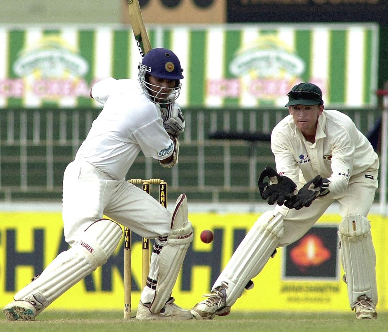 Kumar Sangakkara cuts a ball as Andy Flower looks on, Sri Lanka vs Zimbabwe, 1st Test, Colombo, SSC, December 27-31, 2001